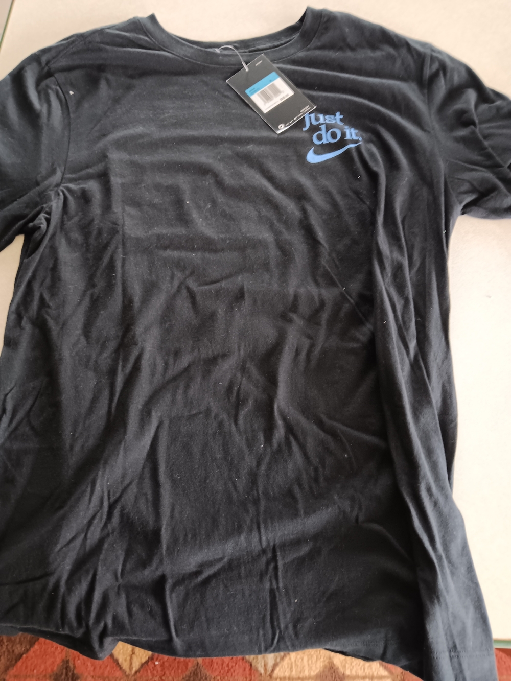 Nike Men’s Black Short Sleeve Tee with Blue 'Just Do It' Graphic Size Medium